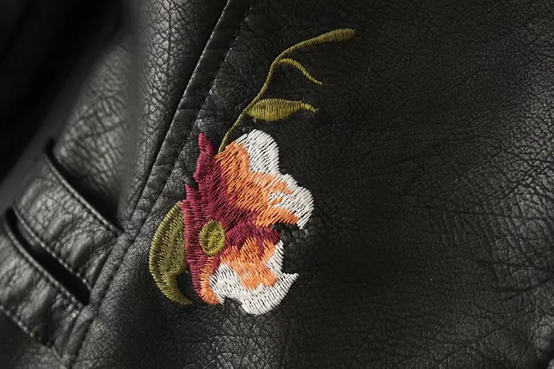 Embroidered studded leather jacket