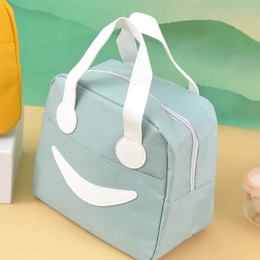 Stylish and elegant smiley lunch bag .